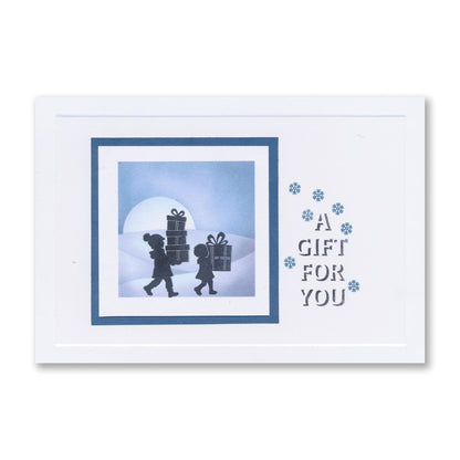 Handmade Christmas card featuring two figures carrying presents with the "A Gift for You" sentiment created with the Wee Christmas Friends & Family Silhouettes A5 & A7 Stamp Collection